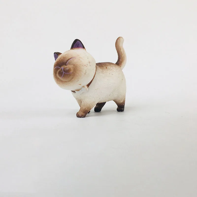 

Миниатюрные фигурки кошек umfinger