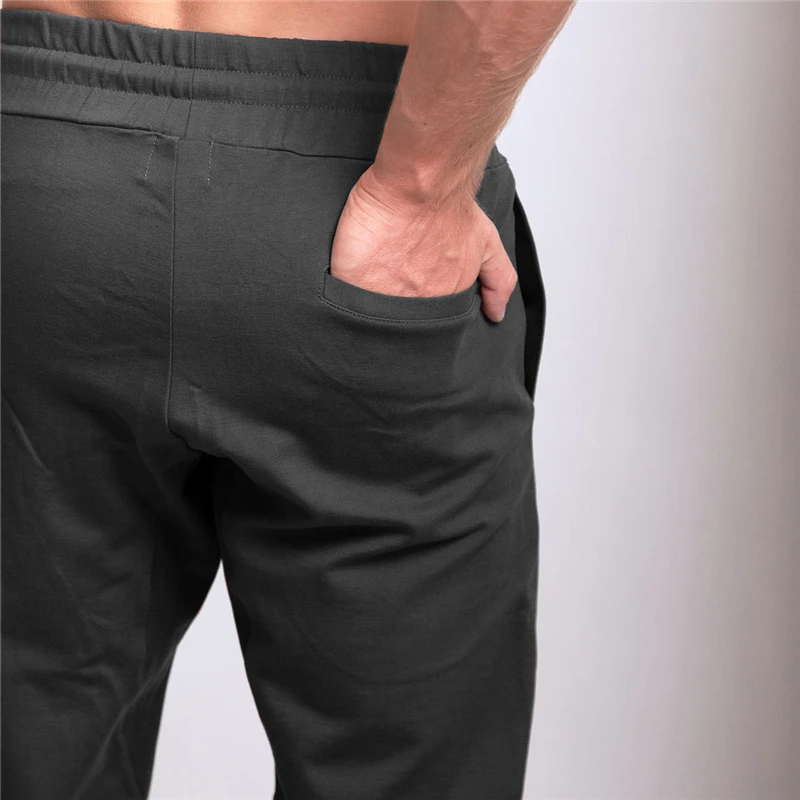 

Mens Sweatpants Gyms Fitness drawers Bodybuilding Joggers workout trousers Male Casual sporting cotton Slim fit Pencil Pants