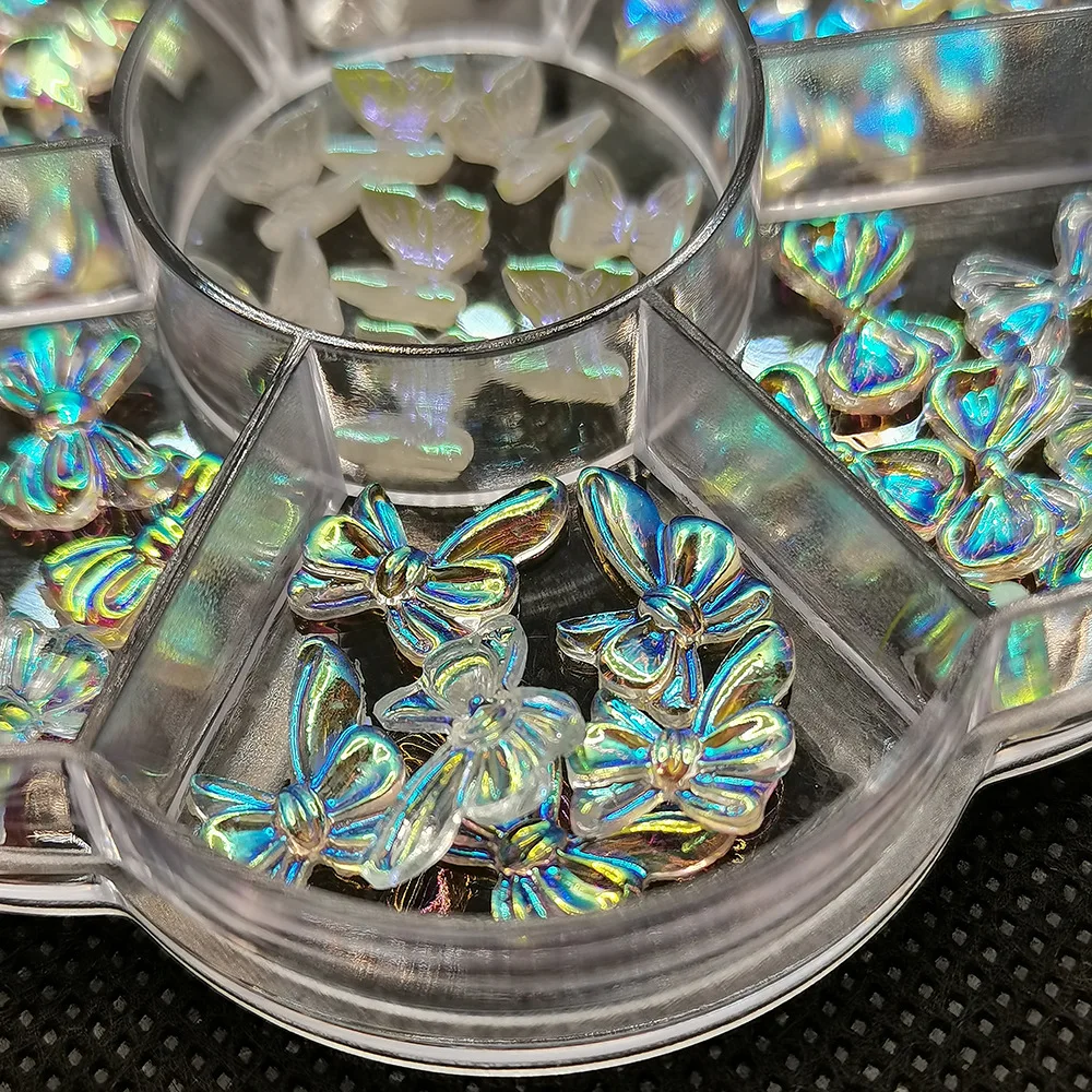 

AB Chrome Aurora Bow 3D Nail Art Set Of 42 Bows and Butterflies Nail Art Charms 1.5*8.3cm Miniature Stone Nail Decoration I0-48F