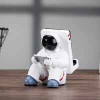 2021 creative astronaut mobile phone stand lazy desktop home astronaut model ornament mobile phone stand decoration gift set toy