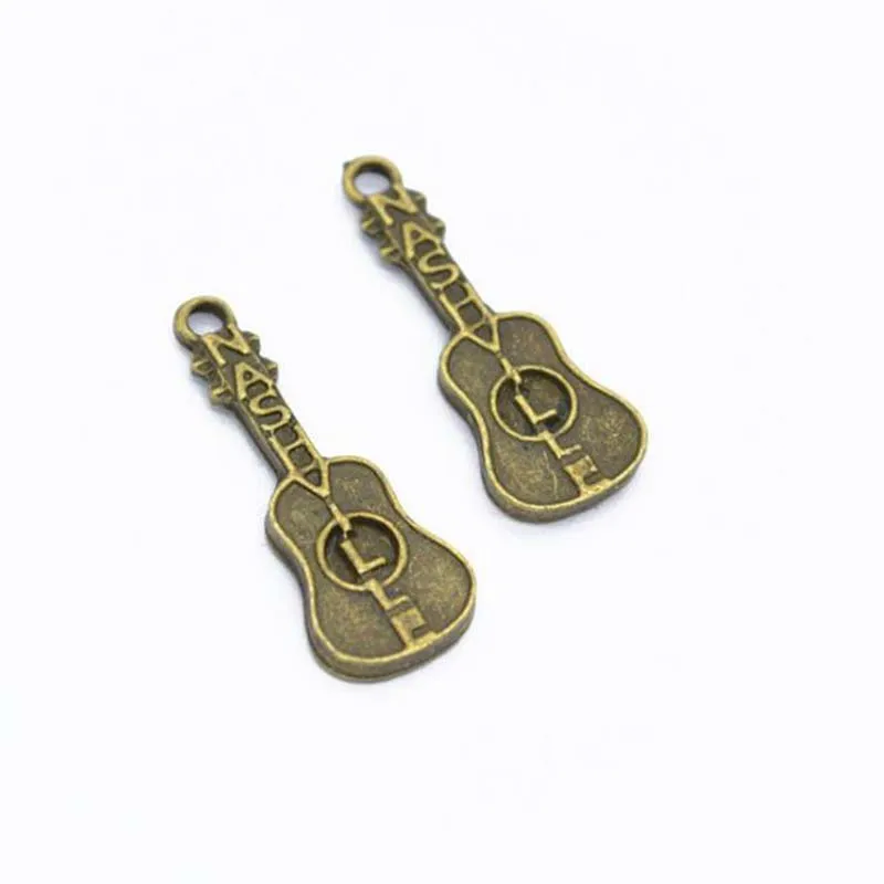 

Letter Nashville In Guitar Charms Tibetan Silver Antique Bronze Music Instrument Guitars Charm Pendants 31x11mm