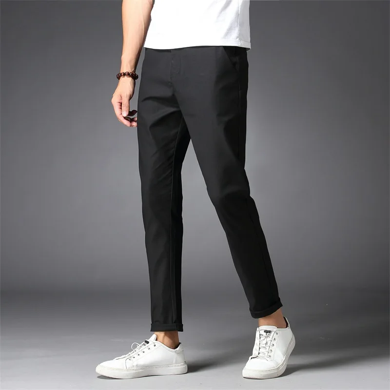 

Мужские весенние модные однотонные зауженные прямые брюки в Корейском стиле, мужские деловые повседневные хлопковые удобные простые свобо...