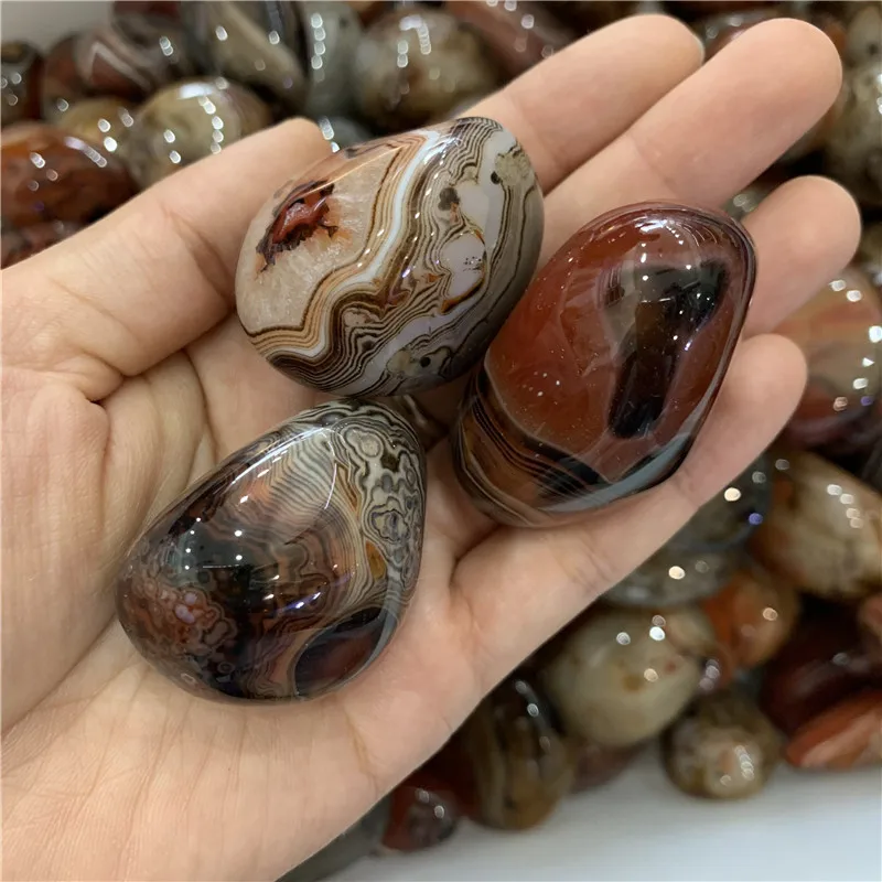 

Best selling price 1000g natural sardonyx agate polished gemstone reiki healing crystals tumbled palm stone for home decoration