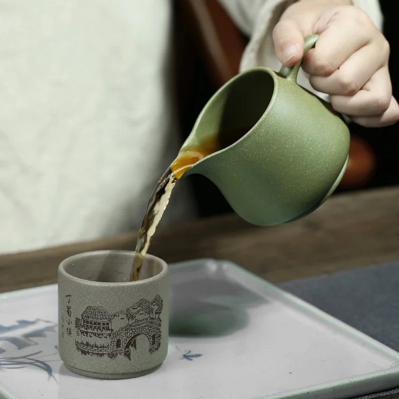 

Two yixing all hand purple sand tea accessories fair undressed ore pea green sand cup 270 cc