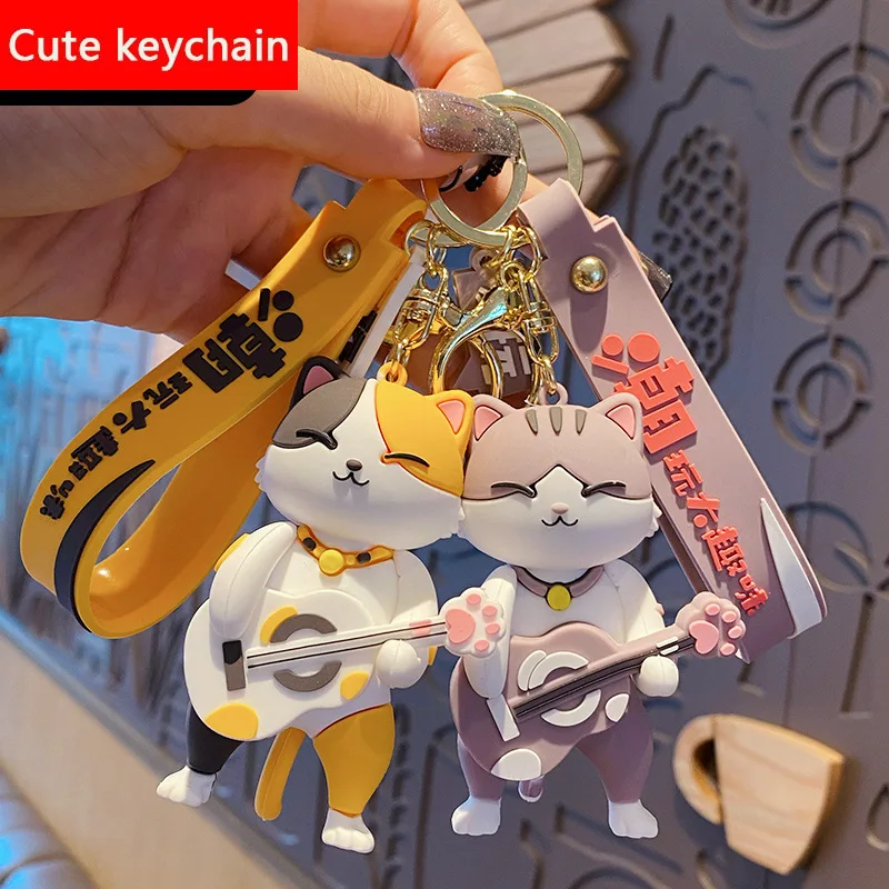 

New Fashion Cute Guitar Kitty Leather Bag Car Keychain Plastic Soft Rubber Doll Pendant Key Holder Ring Accessories Jewelry Gift