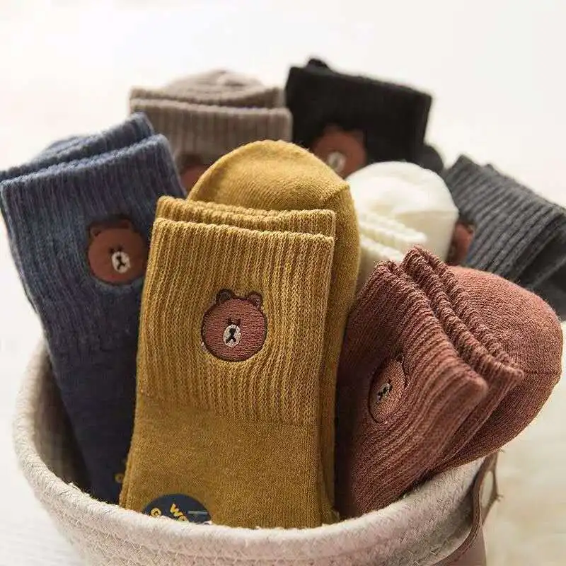 

A pack of three pairs of socks women's tube socks Harajuku style cartoon Japanese spring and autumn long tube cotton socks