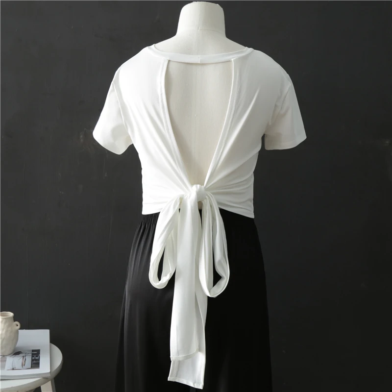 

KUSAHIKI Sexy Bow Bandage Backless Women T Shirts Korean Short Sleeve O-neck Graphic Tees 2021 Spring Summer Short Tshirt 6F259