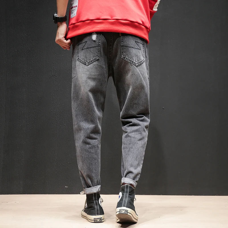 Мужские рваные джинсы с дырками скинни от известного дизайнера байкерские