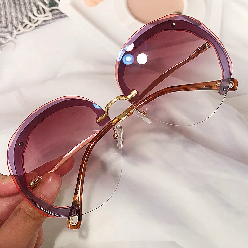 

2022 New Fahsion Brand Oversized Round Sunglasses For Owmen Vintage Alloy Bend Leg Rimless Sun Glasses Female Elegant Shades