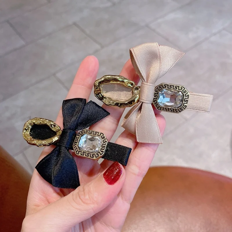 

Bow hairpin Korean side hairpin net red black word clip Korean rhinestone simple retro head jewelry