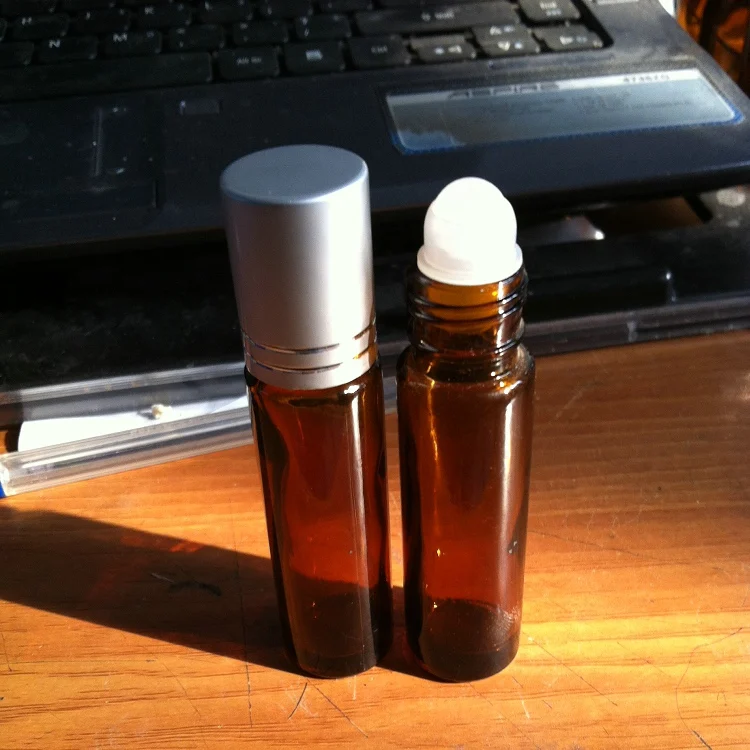 

Hot sale 500 x 10ml Roll on perfume bottle, 10 ml amber essential oil roll on bottle, small glass roller container