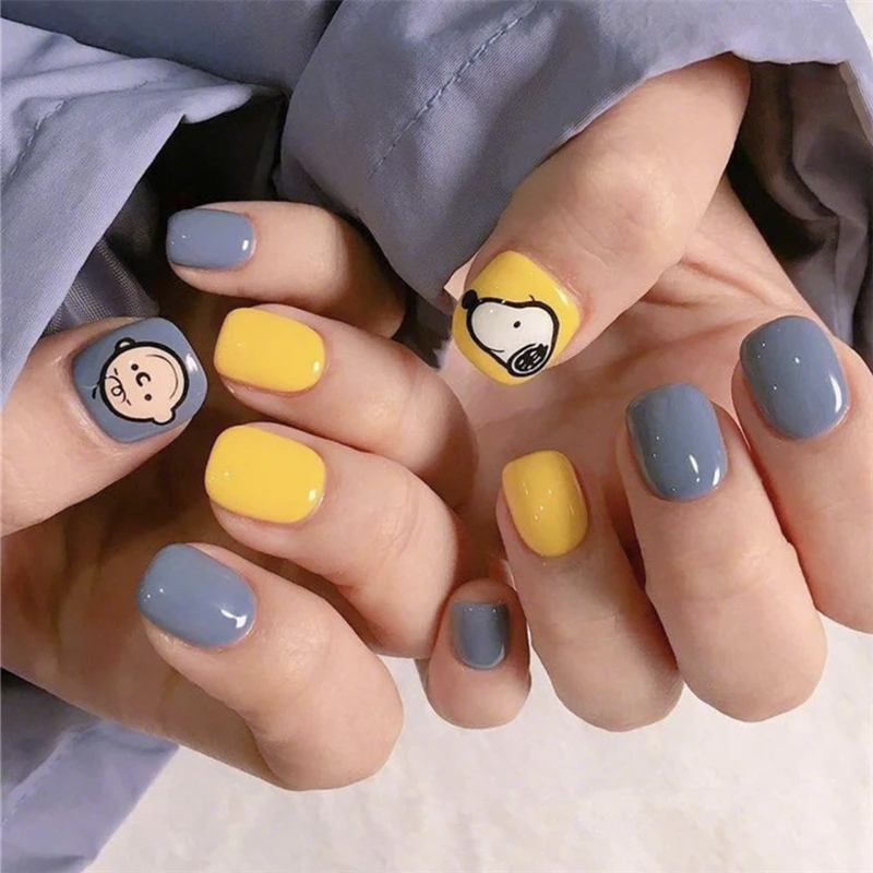 Накладные ногти ярко желтого и кремового синего цвета с мультяшным рисунком
