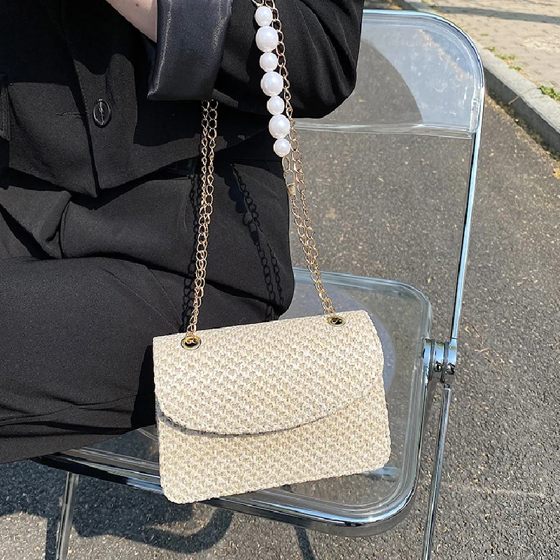 

2021 New Luxurious Chains Messenger Bag Vintage Women Straw Woven Messenger Vacation Pearl Chain Solid Color Handbag Bohemian