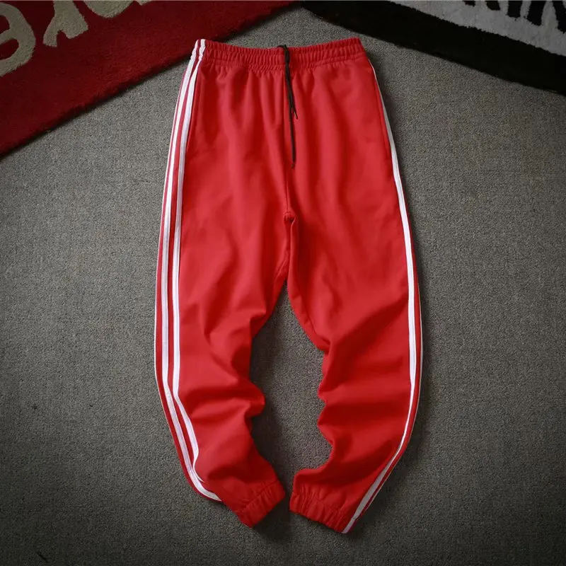 

2021 autumn and winter sports pants men's Korean trend casual pants striped couple men and women tie pants + clothes