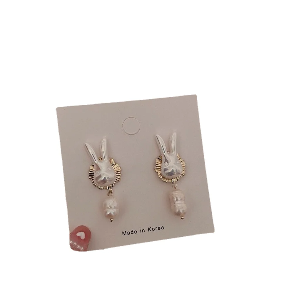 

2021 new European and American ladies party gift alloy 925 silver needle pearl bunny earrings personality fashion trend earrings