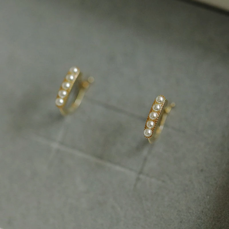 

Классические серия инкрустированных однорядных жемчужных сережек с пряжкой темпераментные Элегантные Очаровательные женские ювелирные изделия Свадебные аксессуары для помолвки