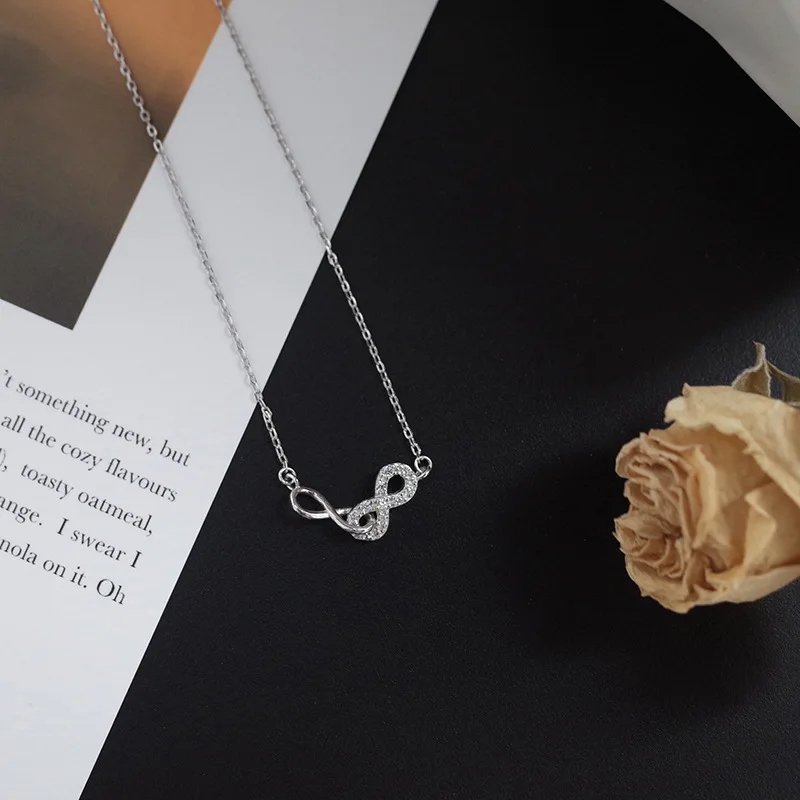 Женская цепочка серебряного цвета с кубическим цирконием и бантом | Украшения