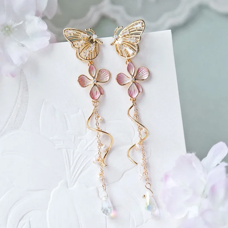 

Spring and summer new dream asymmetric pink flower tassel temperament lady sweet fairy earrings long