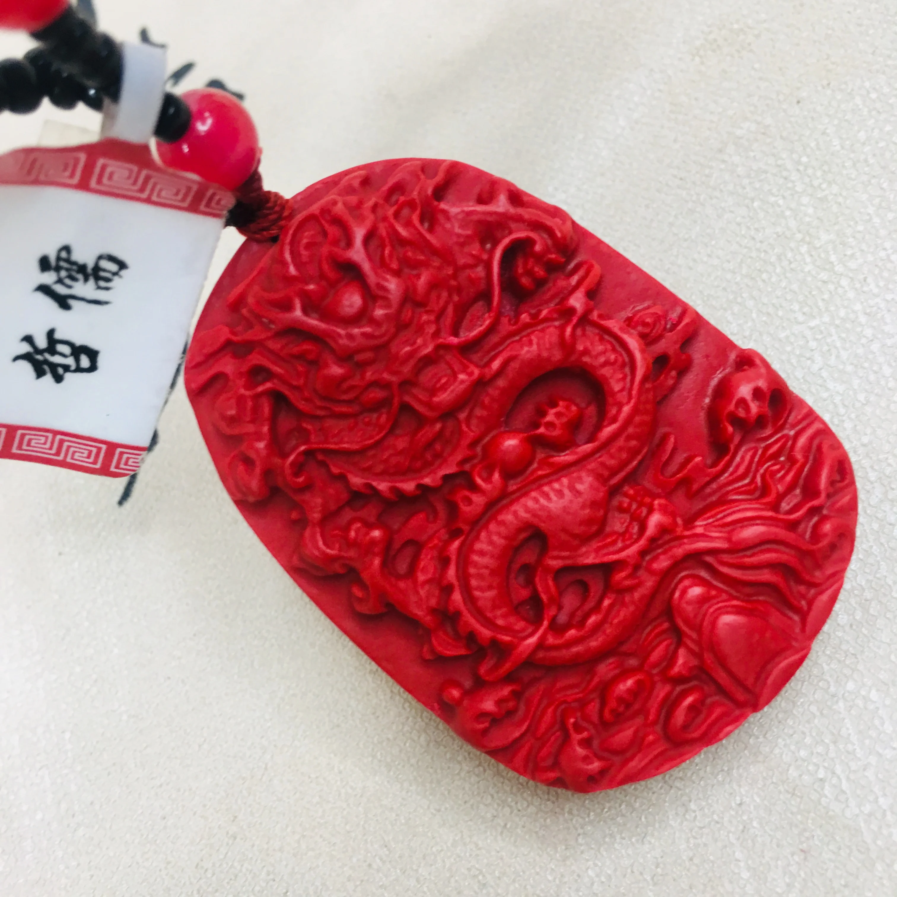 

Zheru natural cinnabar carved red large flying dragon pendant with cinnabar bead necklace men and women sweater chain