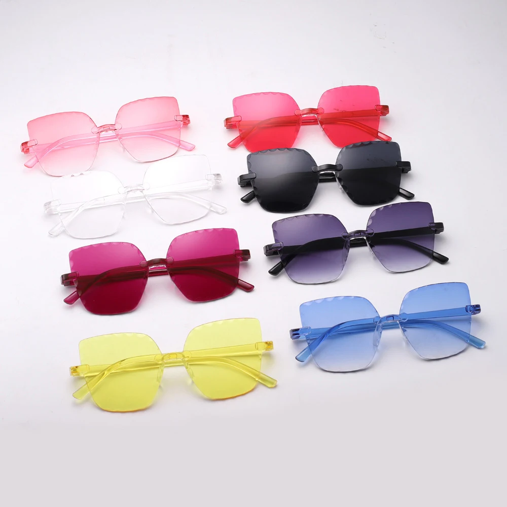

Butterfly Shape Serrated Edge Cutting Lenses Women's Sunglasses One Piece Rimless Candy Color Sun Glasses For Girls Photography