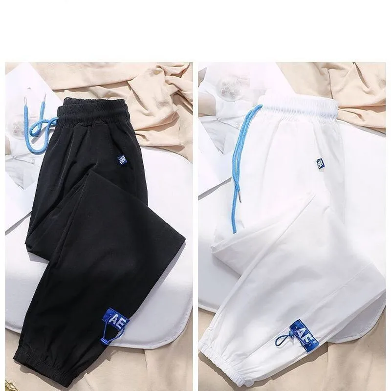 

2021 New Summer Sports Pants Women Ice Silk Soft Quick-Drying Feet Loose Thin Drawstring Nine Points Slimming Casual Pants