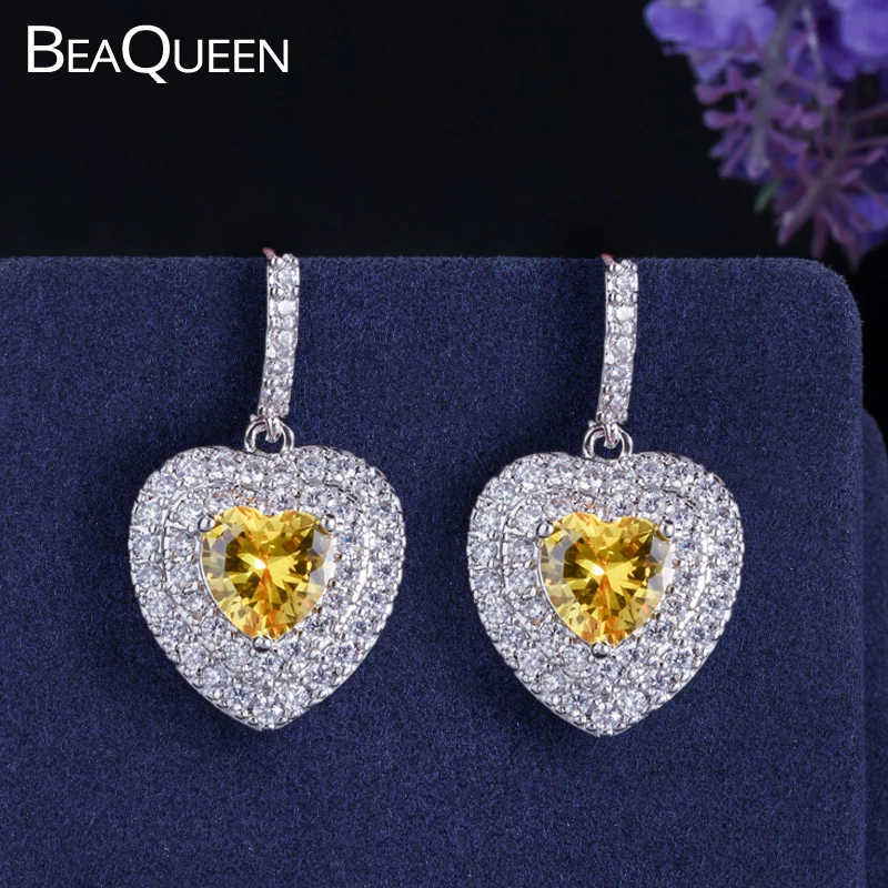 Женские серьги подвески с фианитами BeaQueen подвесками в форме сердца желтого цвета