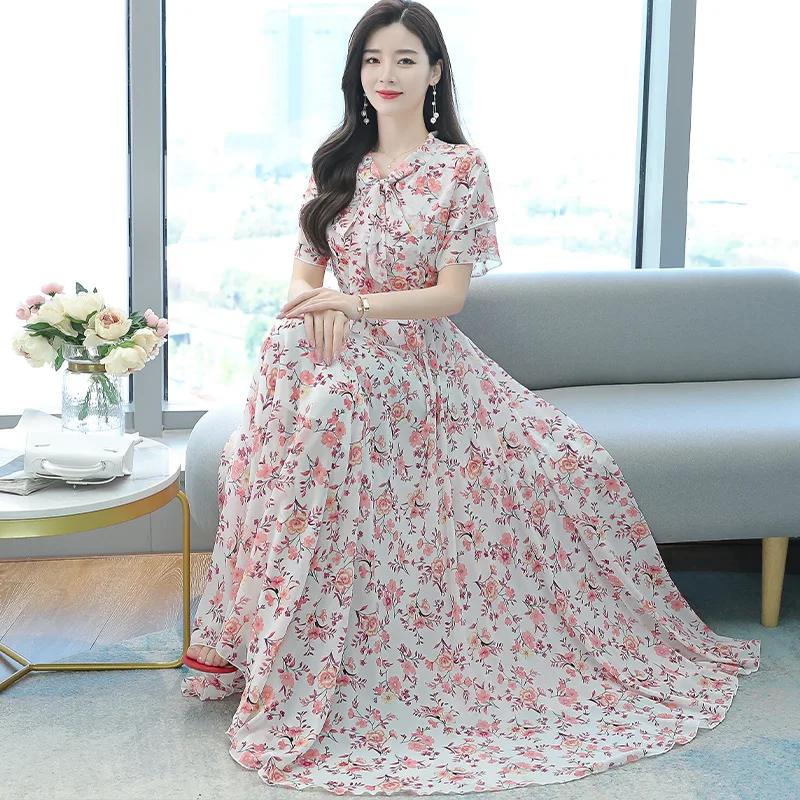 

In the summer of 2021, the new waist is tall, slim and long, and the printed fairy short-sleeved dress is retro and large