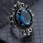 Женское кольцо с синим камнем, в форме яйца