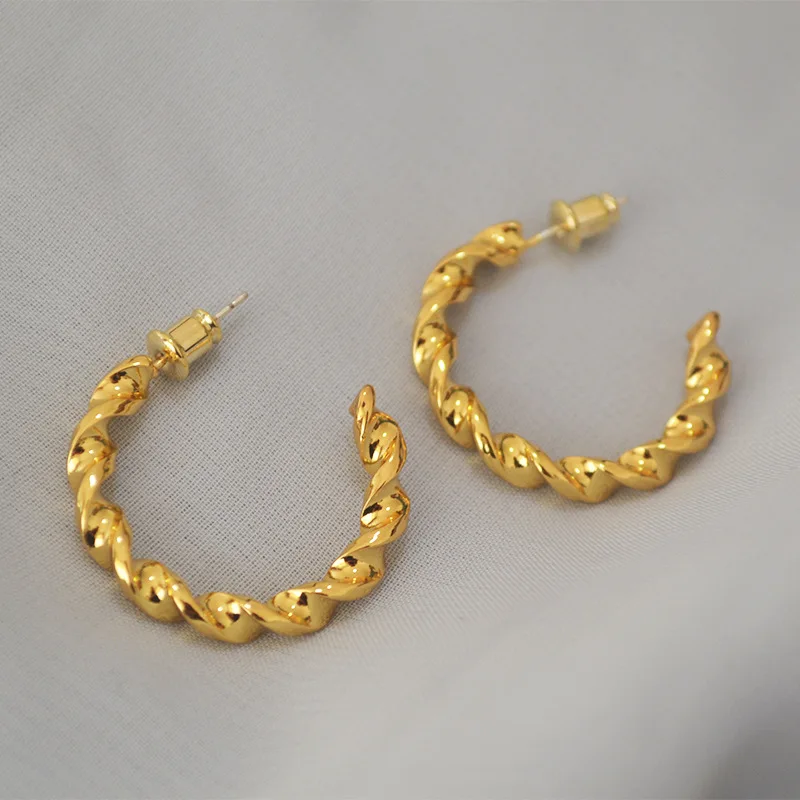 

Korean fashion simple brass twist spiral C word Earrings