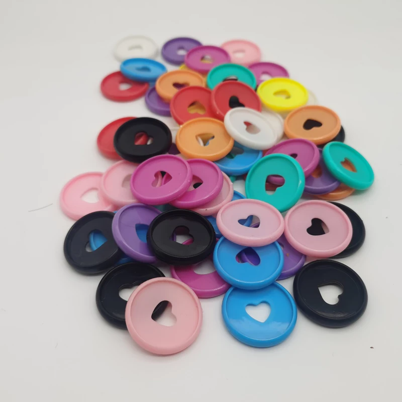 Рисунок 3 - Переплетные кольца с отверстиями в виде грибов