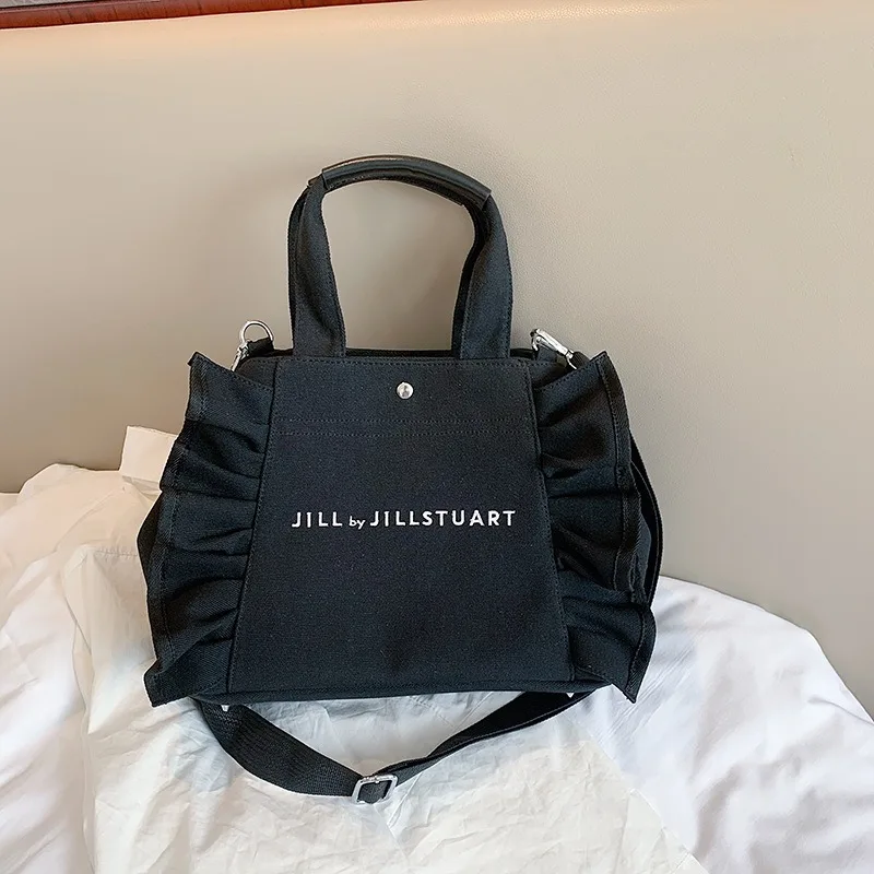 

Korean style canvas women handbag large capacity Ruffle design female Shoulder Crossbody bag leisure big totes Casual Travel bag