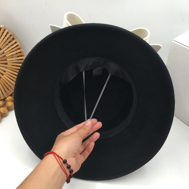 

British socialite Hepburn wind small big brim fashion show face basin hat bowknot Japanese female qiu dong small fisherman