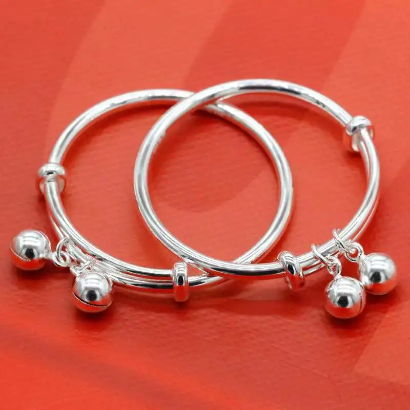 Браслет из серебра 9999 пробы с колокольчиком и надписью Благословение ребенка |