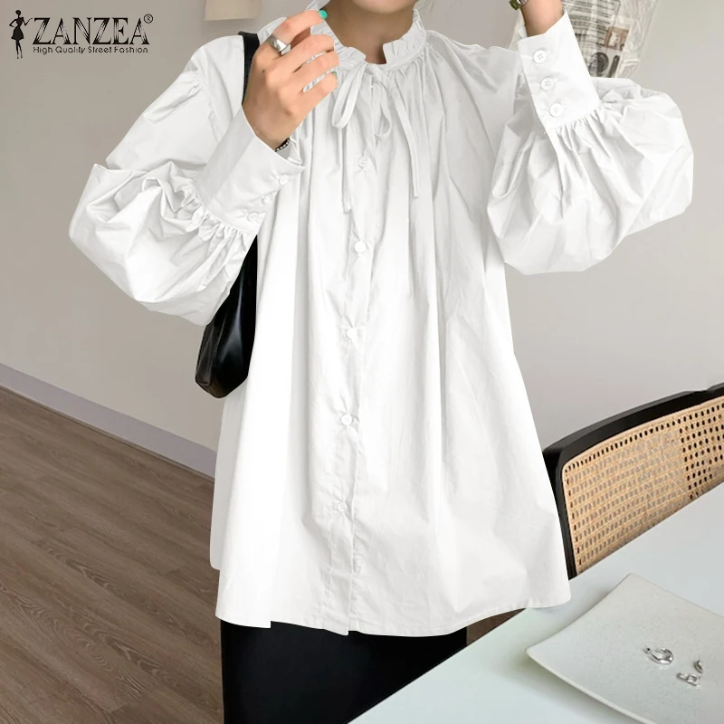 

Женская блузка с длинными рукавами-фонариками и круглым вырезом