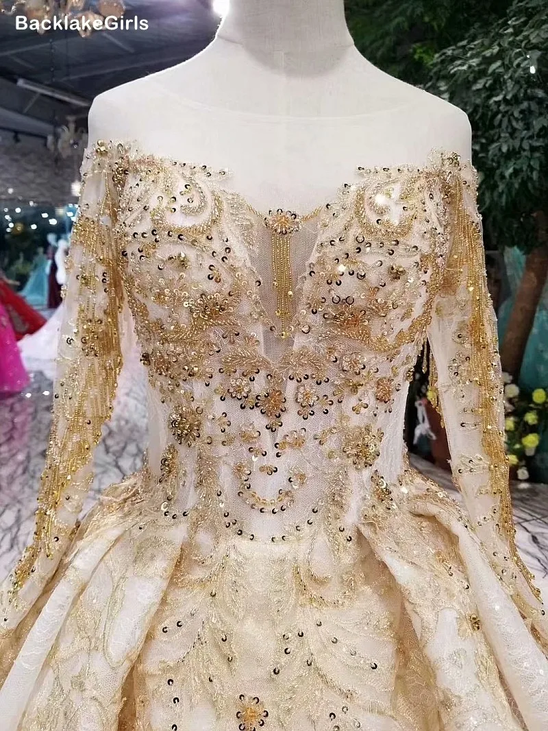 Свадебное бальное платье цвета шампанского и золотого свадебное с круглым