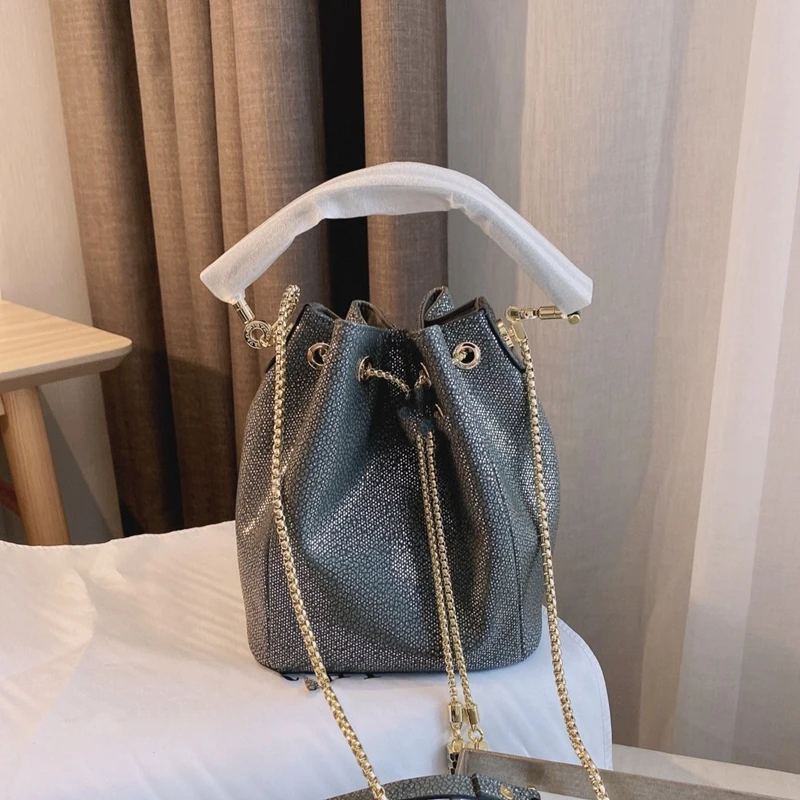

2021 spring and summer new snake head enamel bucket bag woman bag fashion shoulder bag casual all-match messenger bag