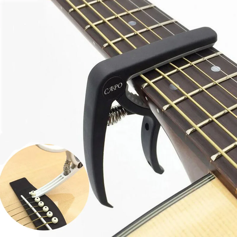 kunststoff gitarre capo für akustische elektrische gitarren klassische gitarre capo ukulele capo mit brücke pin puller free global shipping