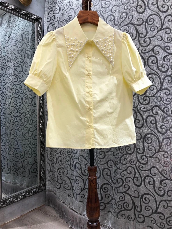 

2021 early spring new fashion women's bead decoration lapel short-sleeved solid color all-match blouse 104