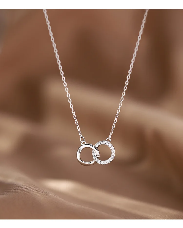 Ожерелье женское с двойным кольцом и прозрачными кристаллами - купить по