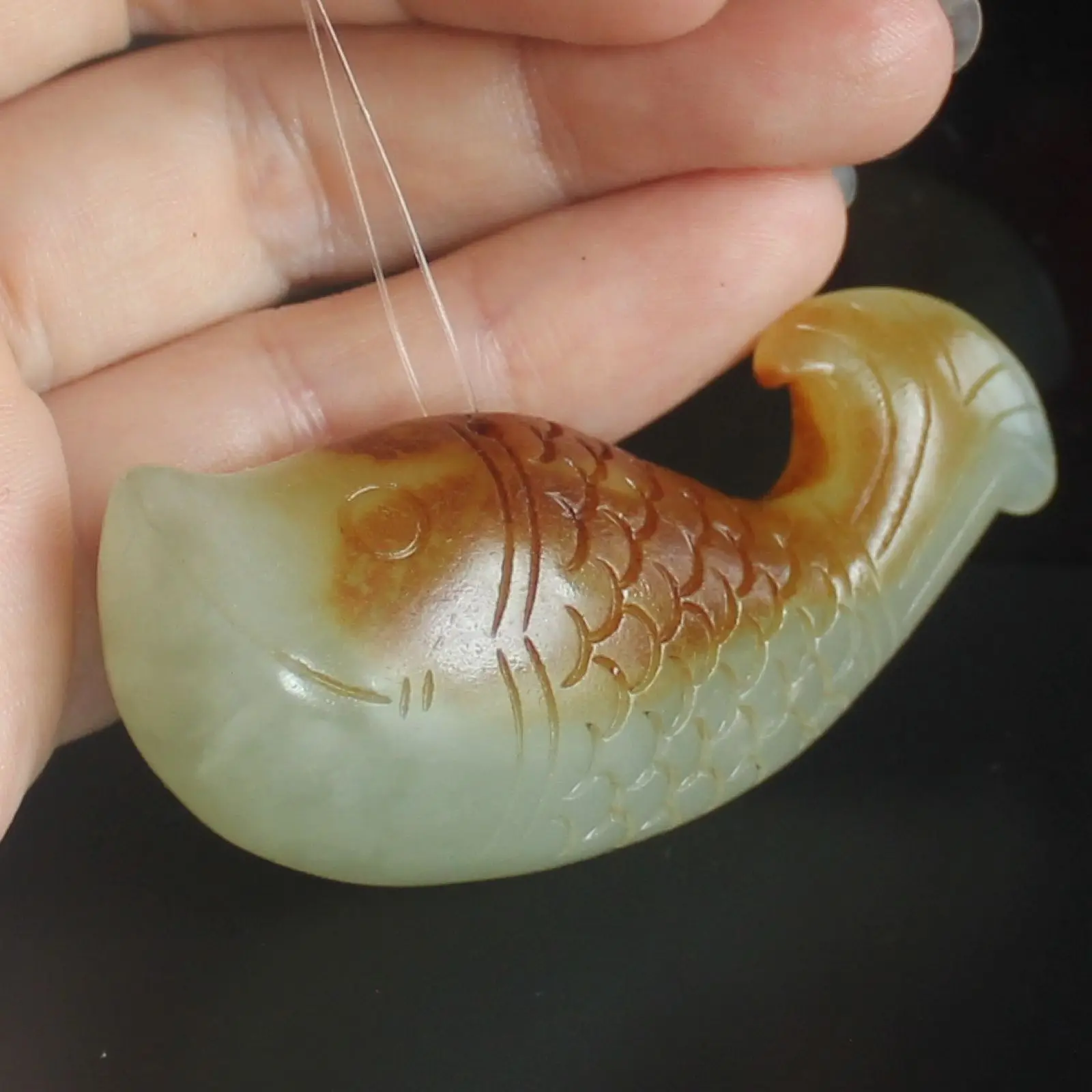 

Carved Chinese old jade fish animal pendant figurine