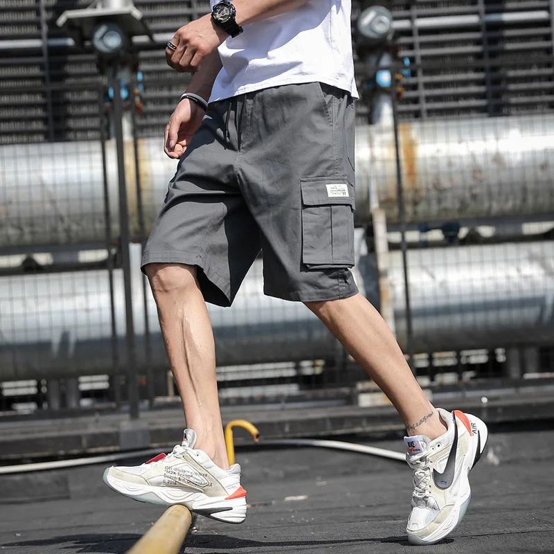 

Summer casual shorts men's tooling wind straight cotton elastic band shorts large size 5XL men's fashion gray black shorts men