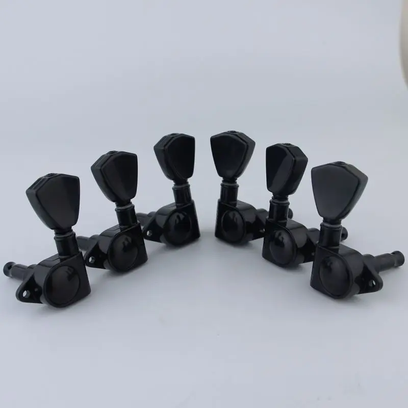 

Guyker Guitar Machine Heads 3R3L 1:21 Sealed Tuners Tuning Key Pegs with Trapezium Handle for Electric Guitars Black