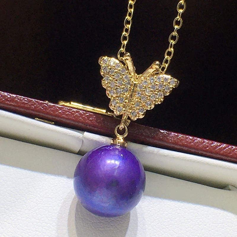 

Подвеска в виде бабочки с фиолетовым круглым жемчугом, 18 К