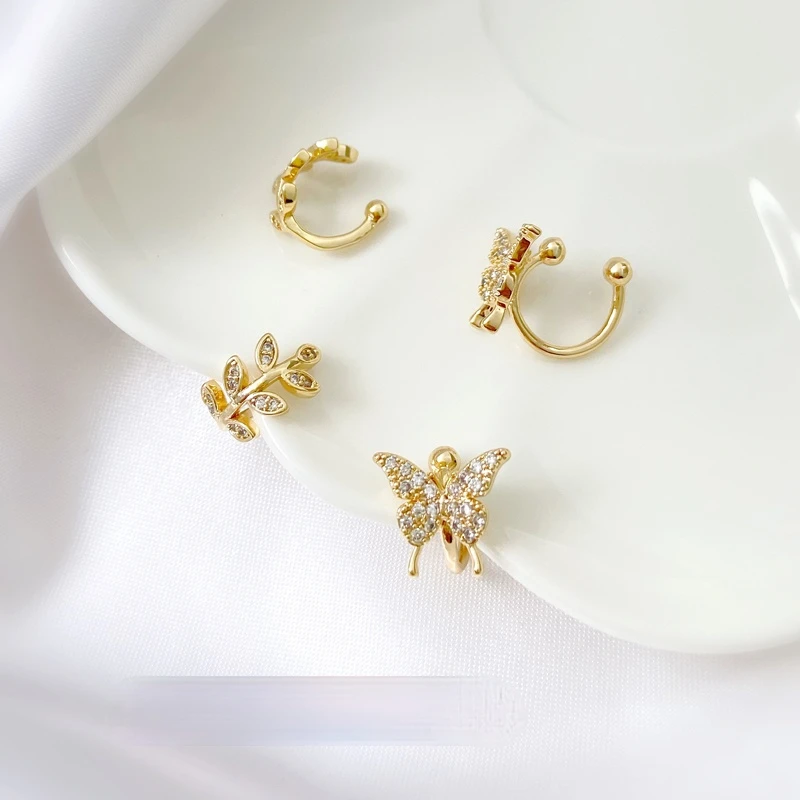 

Серьги-клипсы в виде бабочки, с инкрустированным золотом, 18 карат