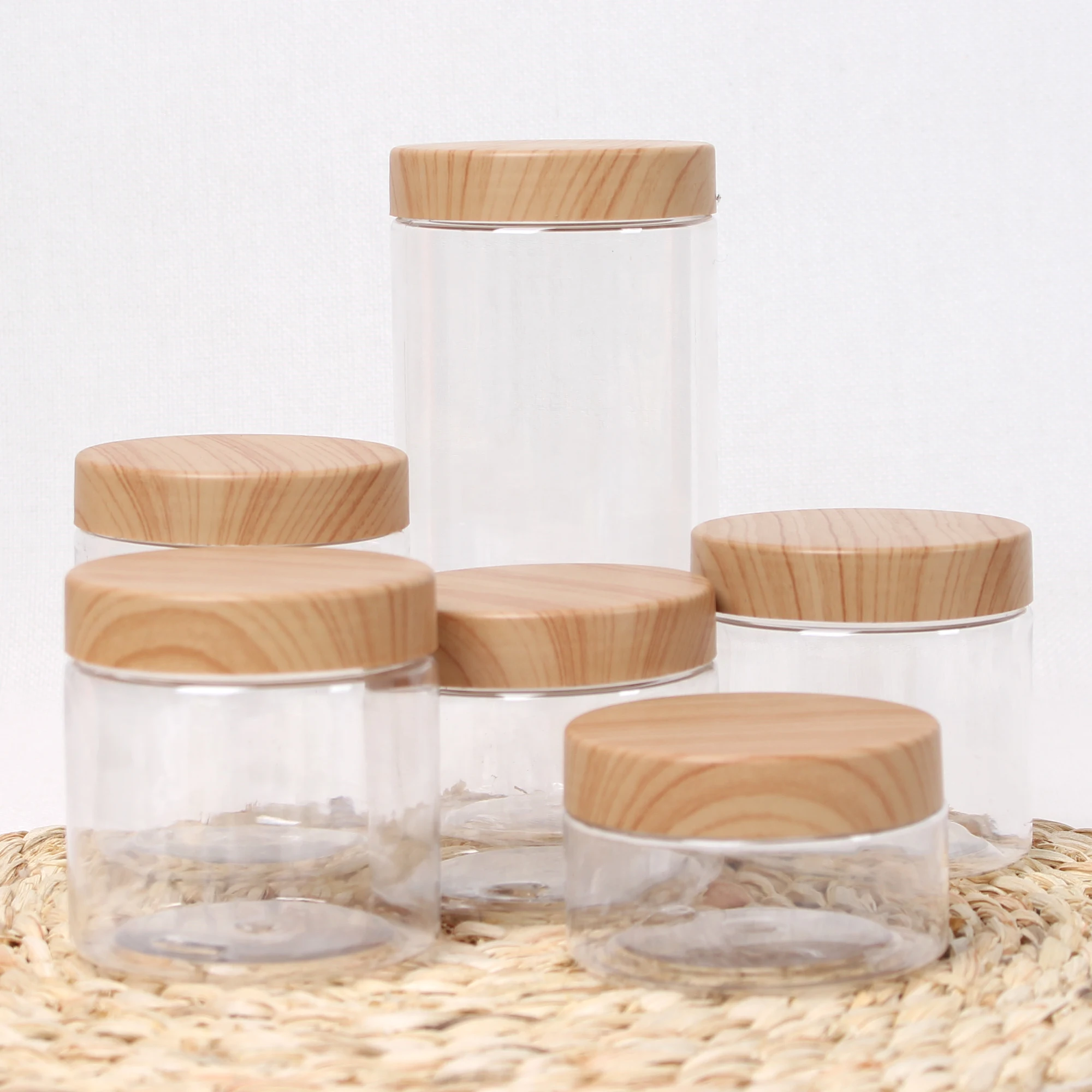 

100ml 200ml 300ml Empty Clear Pet Jar Containers With Plastic Imitation Wood Lid Wide Mouth Lid Container Food Storage