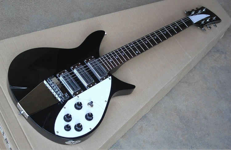 

Guitarra eléctrica de cuerpo negro personalizada de fagrica con herrajes cromados, protector blanco, diapasón de palisandro, 3 p