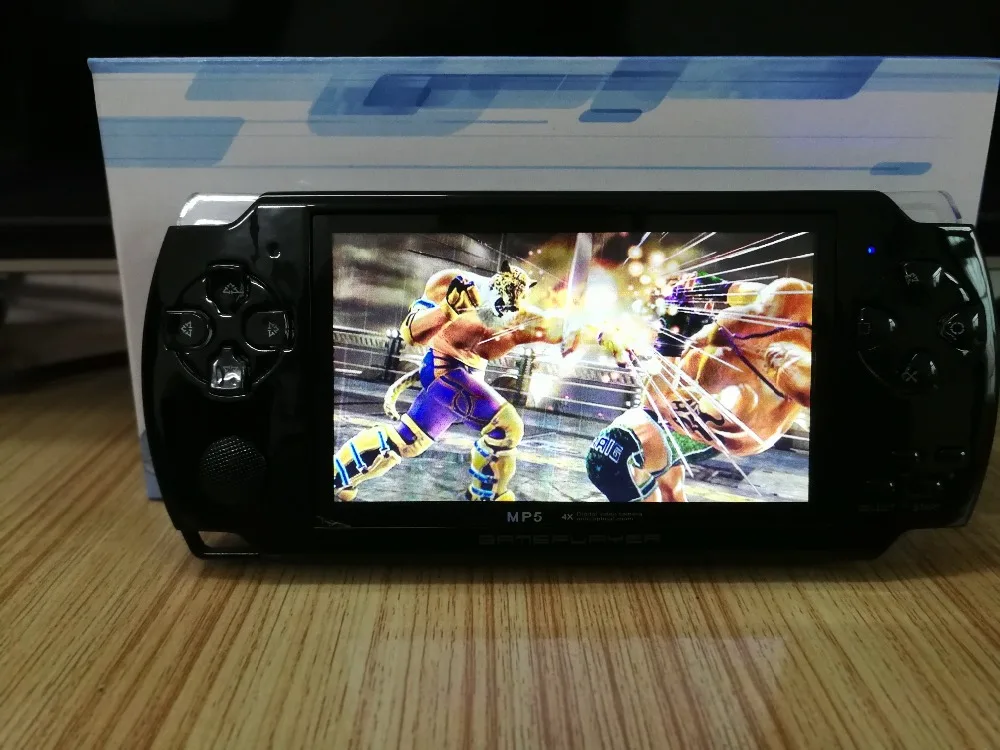 

Built-in 5000 games Support AV Out 8GB 4.3 Inch PMP Handheld Game Player MP3 MP4 MP5 Player Video Camera Portable Game Console