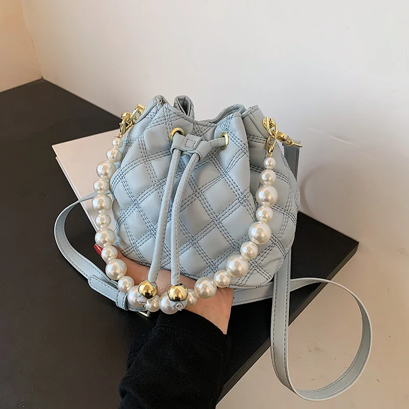 

2021 new fashion chain Single Shoulder Fashion drawstring Mini bucket pearl portable