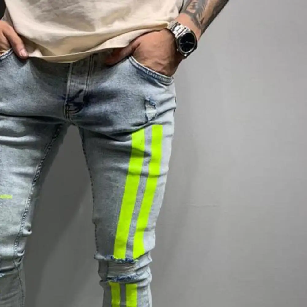 

2021 spring fashion spray paint jeans men's new casual letter printing ripped pencil pants men's autumn slim trousers streetwear