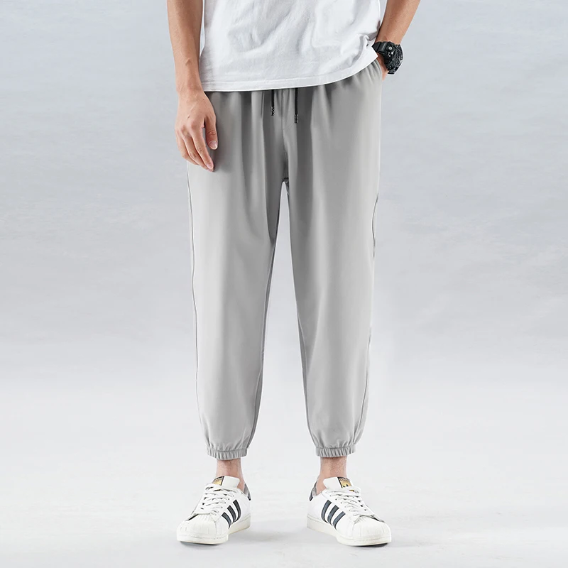 

New Boys' Nylon Four Side Spring Summer Korean Casual Pants Men'S Ice Silk Leggings 9-Point Sweatpants Loose And Trendy Trousers